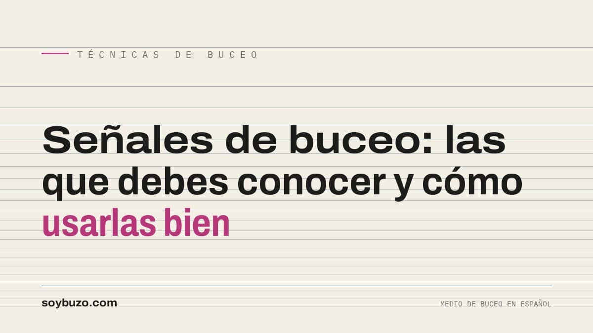 Dos buceadores intercambiando la señal de OK con el pulgar y el índice bajo el agua
