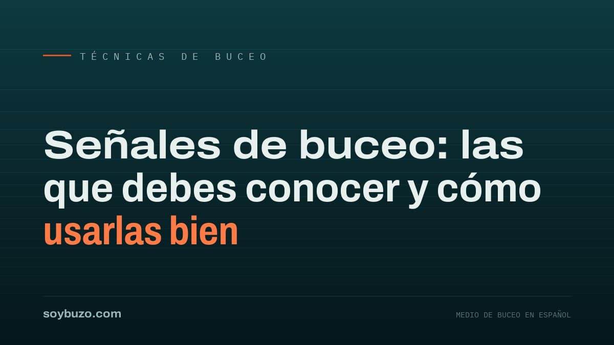 Dos buceadores intercambiando la señal de OK con el pulgar y el índice bajo el agua